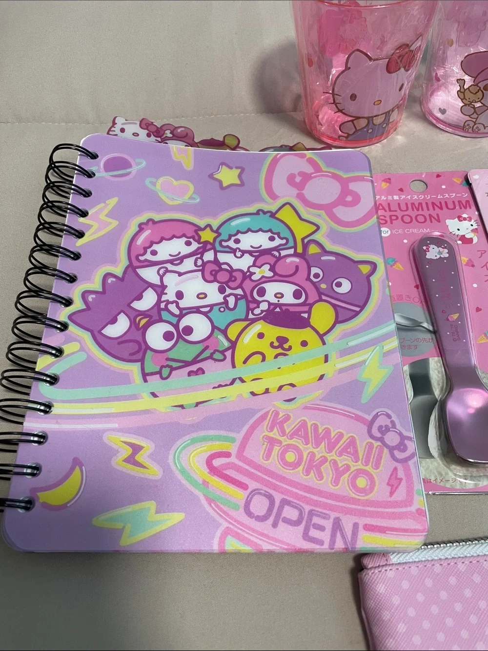 Sanrio Bundle: includes cups, utensils, notebook and zippered pouch.